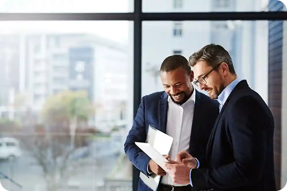 Two men in an office setting.