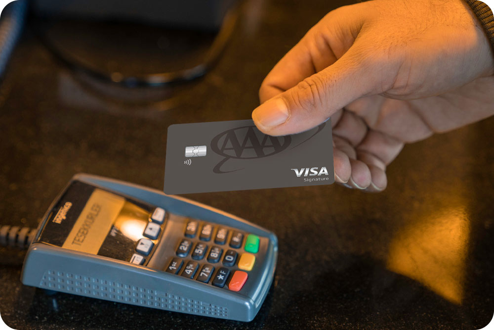 Man using the AAA credit card as tap to pay