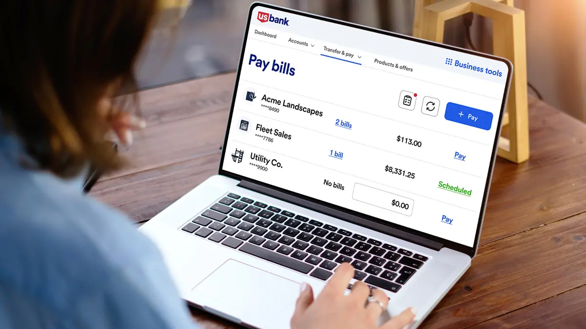 A laptop showing the U.S. Bank bill pay interface.