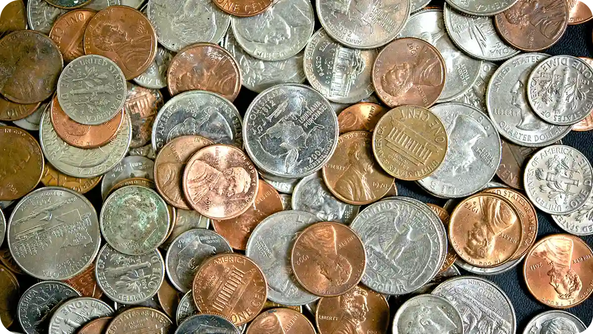 A bunch of coins spread out.