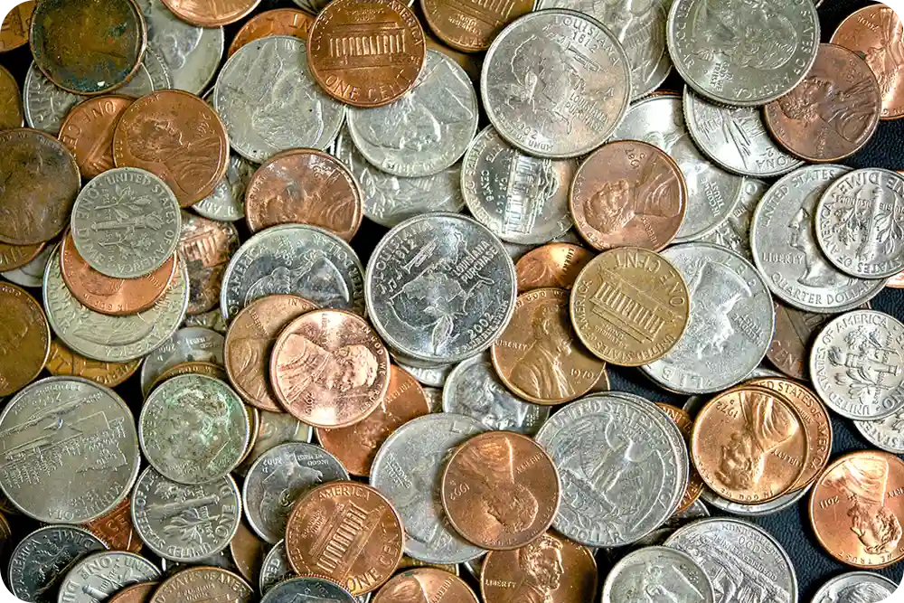 U.S. coins spread out on a surface.