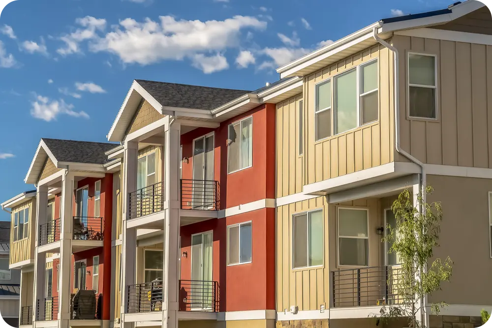 A row of houses on a street.