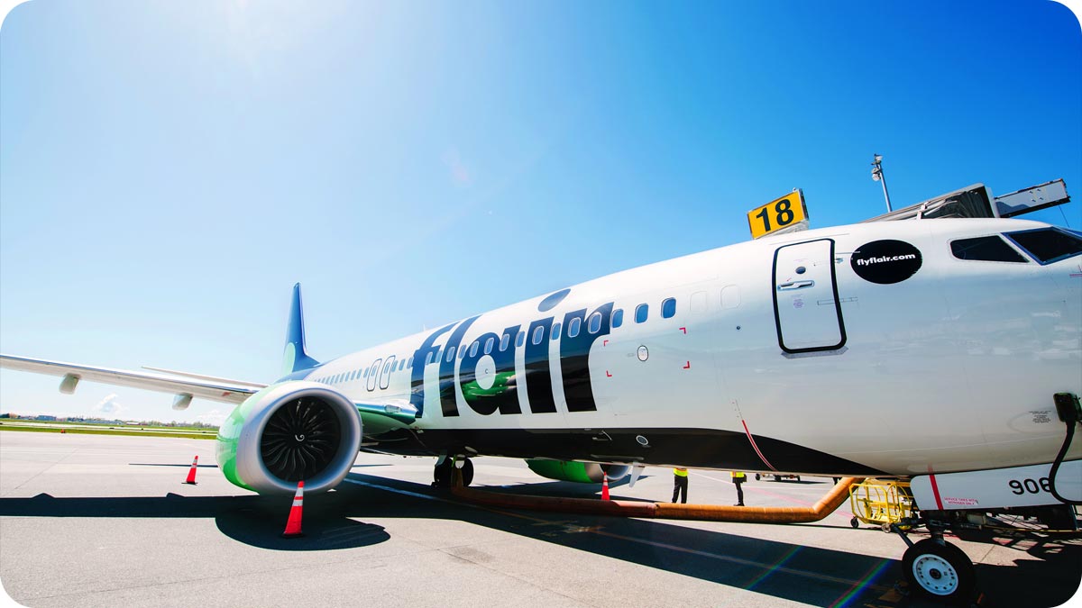 A Flair aircraft at a jetway