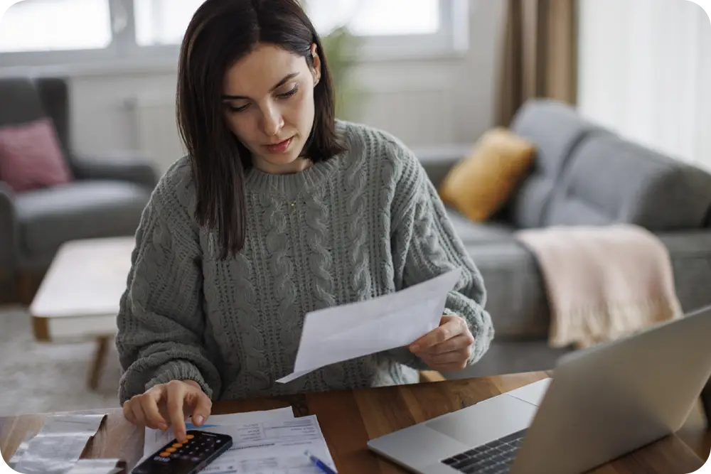 A woman doing paperwork.