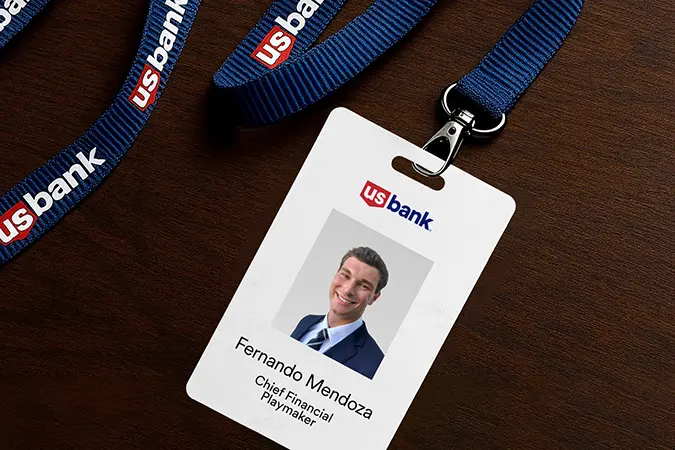 Close up shot of a U.S. Bank employee badge showing Fernando Mendoza.