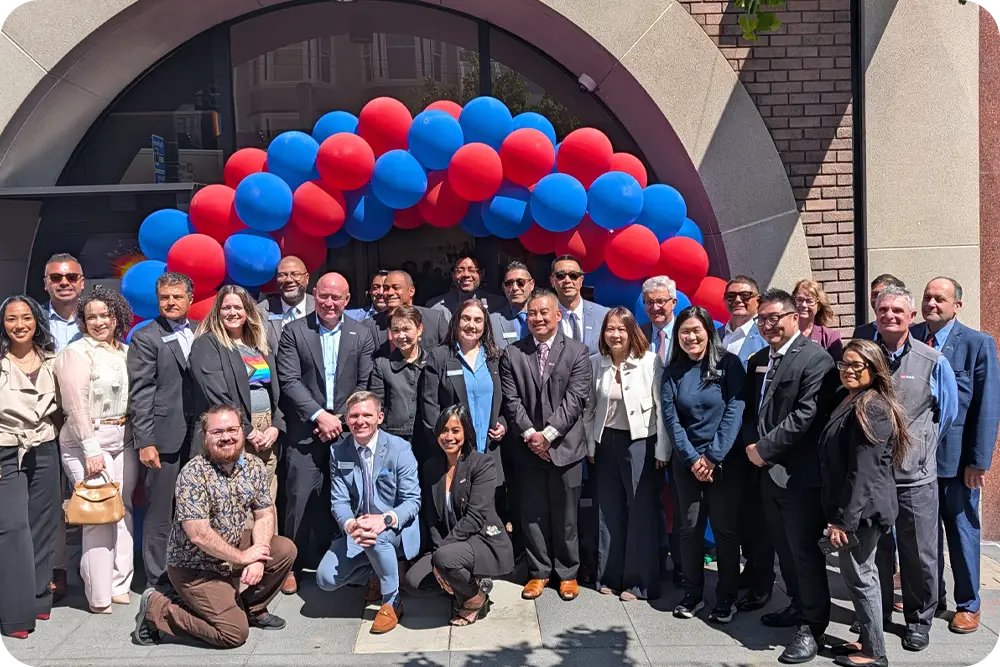 Photo of people celebrating a branch opening