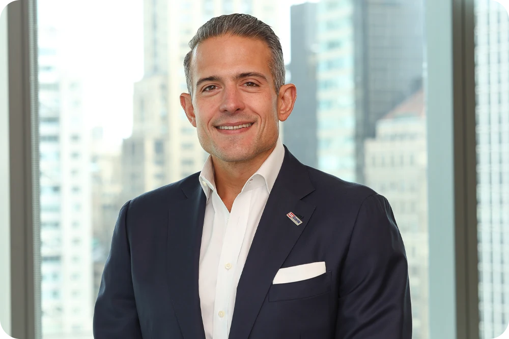 Headshot of a man in a suit