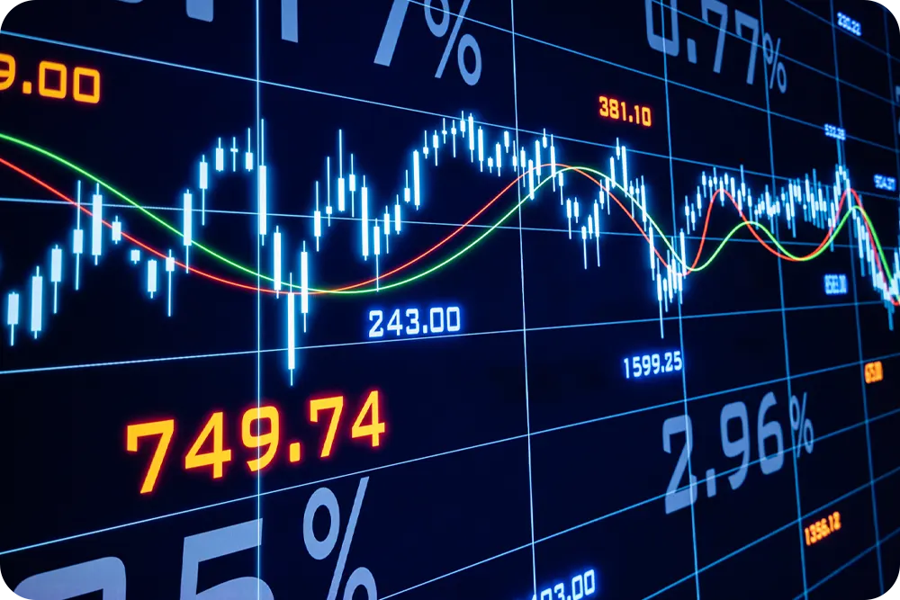 A digital screen with stock prices.