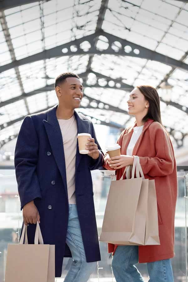 Young couple standing in an airport