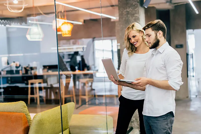 co workers talking outside