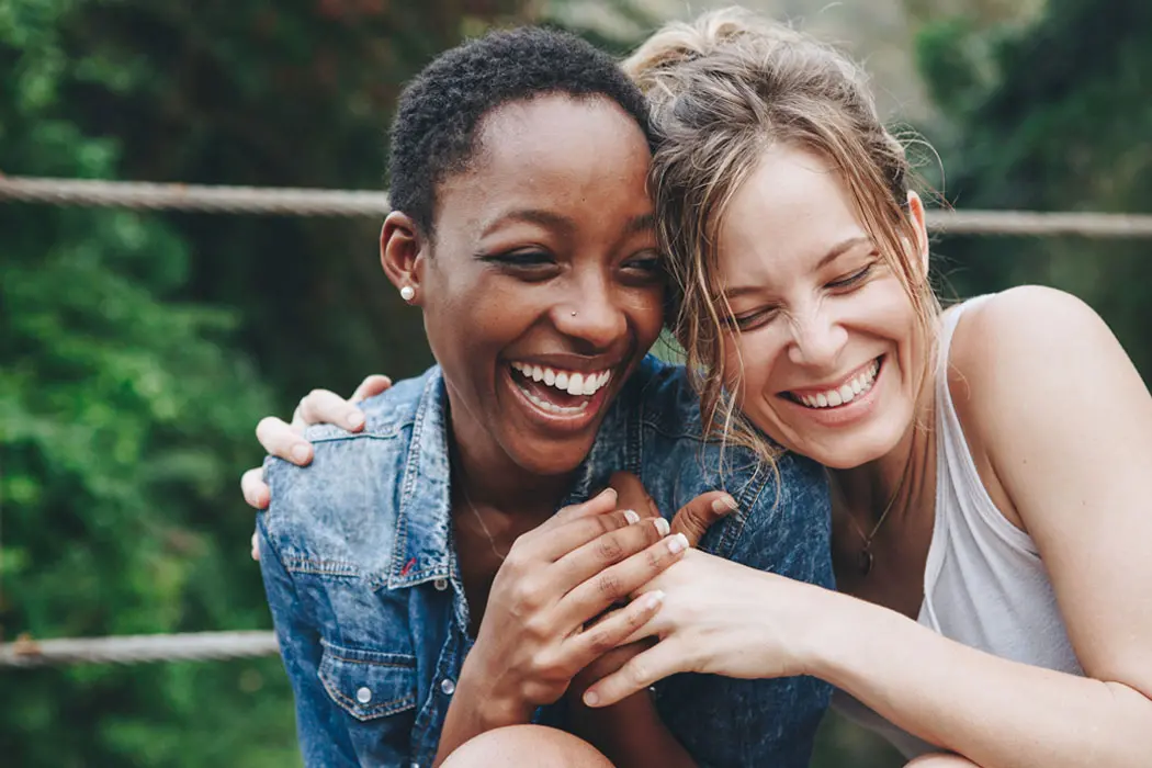 two friends laughing