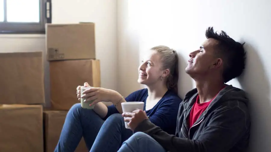 Two individuals discussing details of a mortgage loan