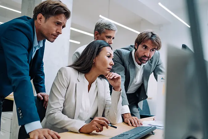 Corporate CEO discusses financial volatility with team