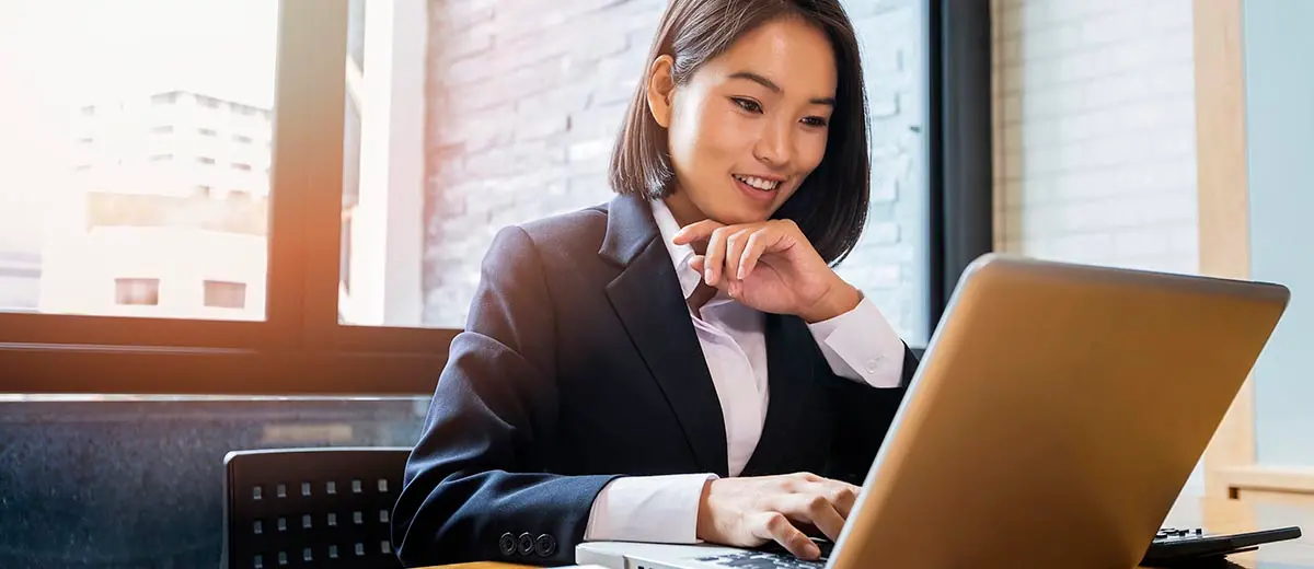 Professional woman making a U.S. Bank wire transfer international