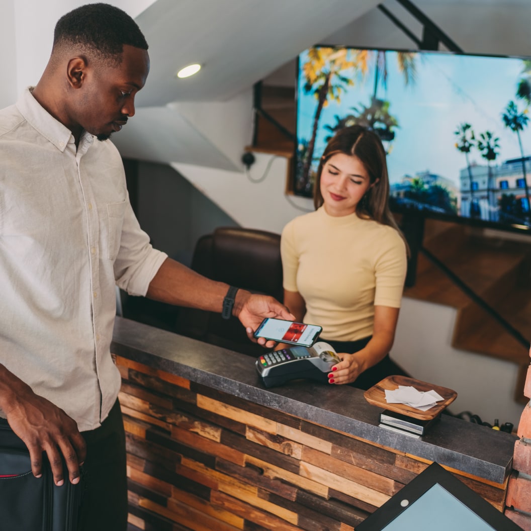 Man checking in at Hotel