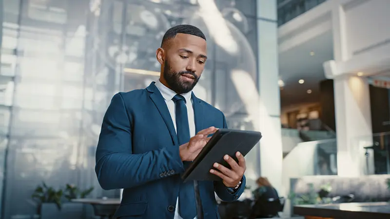 Executive optimizing working capital on a tablet