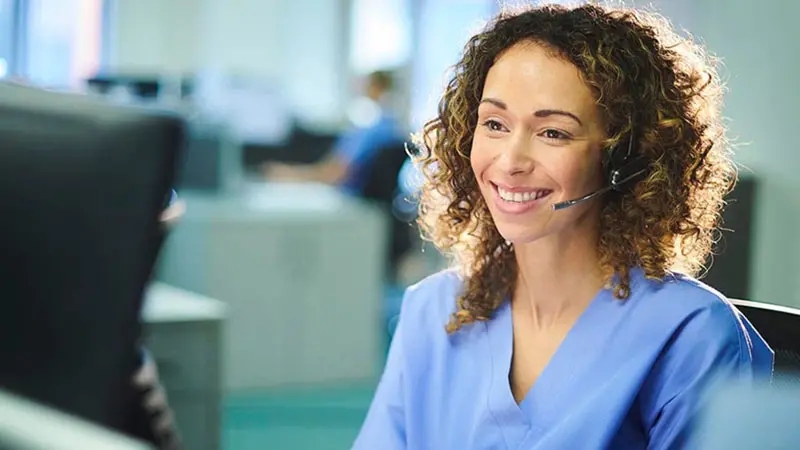 Phone receptionist talking about healthcare payment system billing