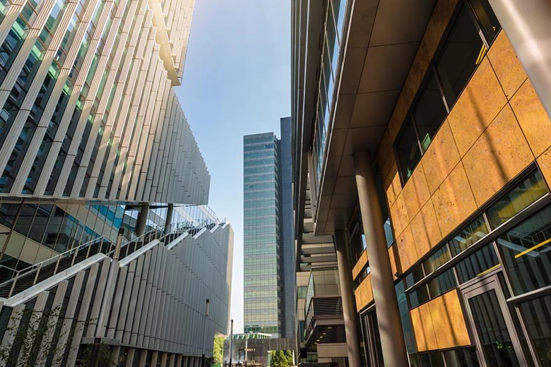 Image of business buildings where businesses make use of faster payment and instant payment methods.