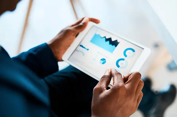 Close up of a person using a tablet