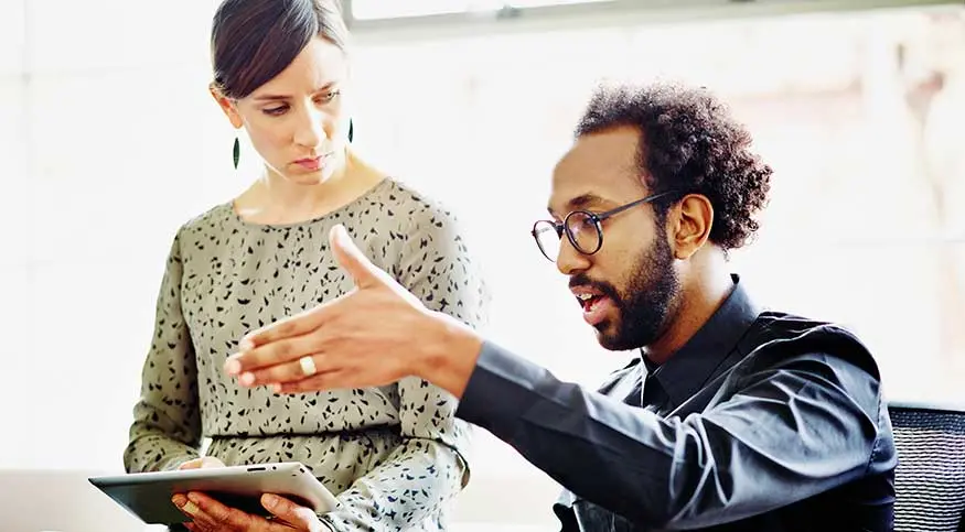 Man and woman discussing ELTIF