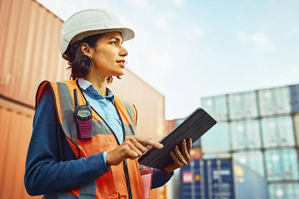Person using a tablet to review freight bill audit and payment
