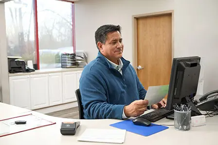 small business owner working in office