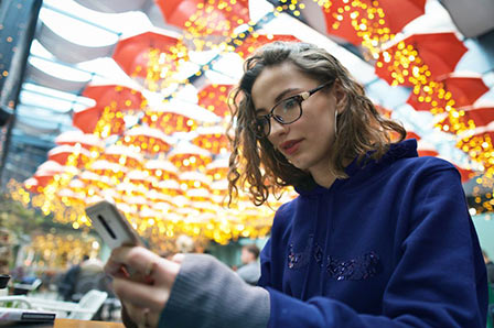 woman checking her smartphone