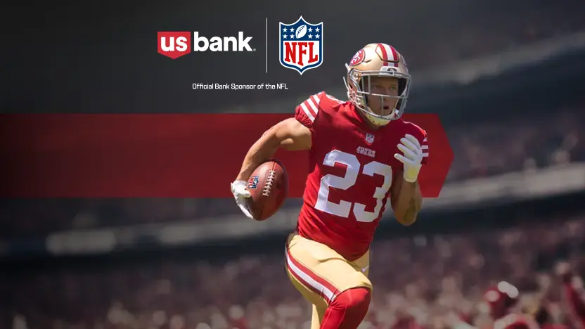 Christian McCaffrey running with football