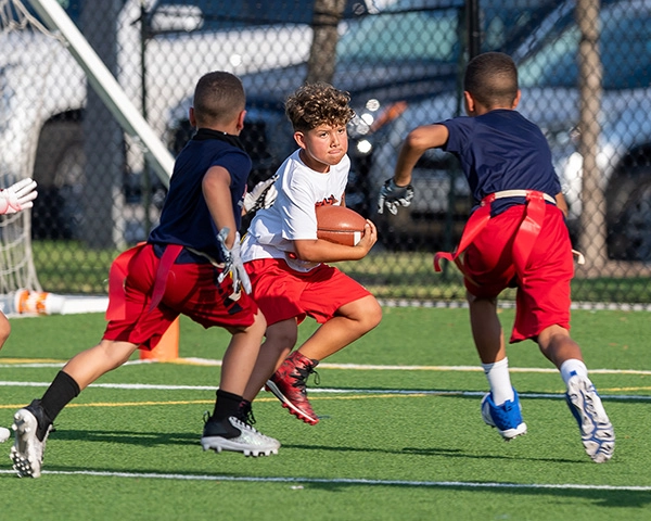 children playing flag football