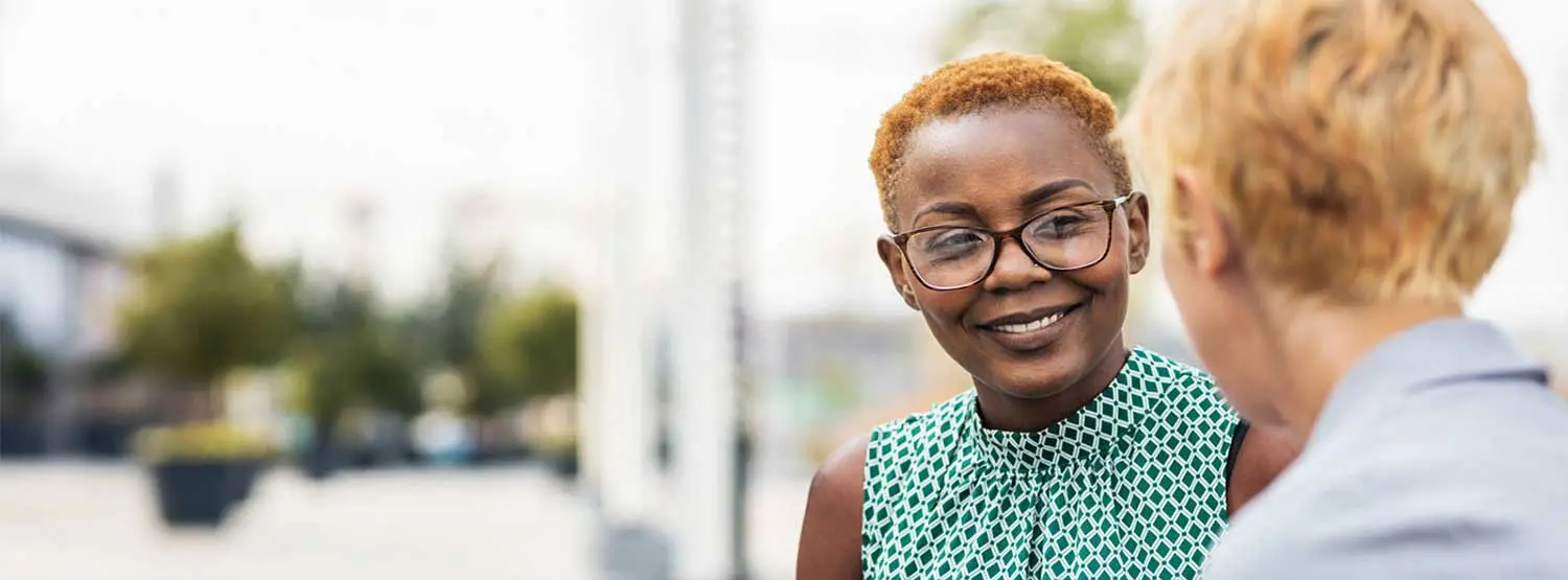 two business women meeting