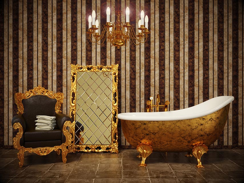 a room with ornate chairs and wallpaper