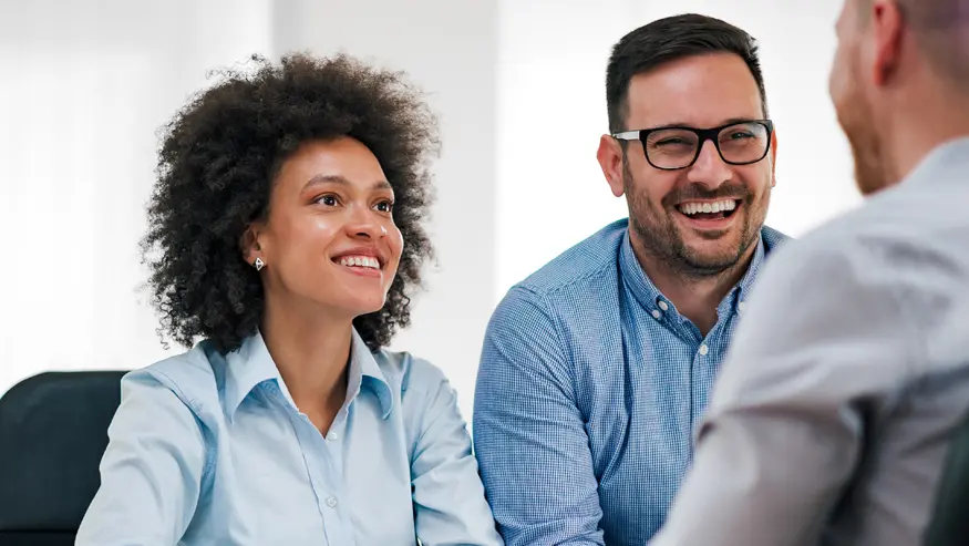 Smiling couple discussing private equity funds