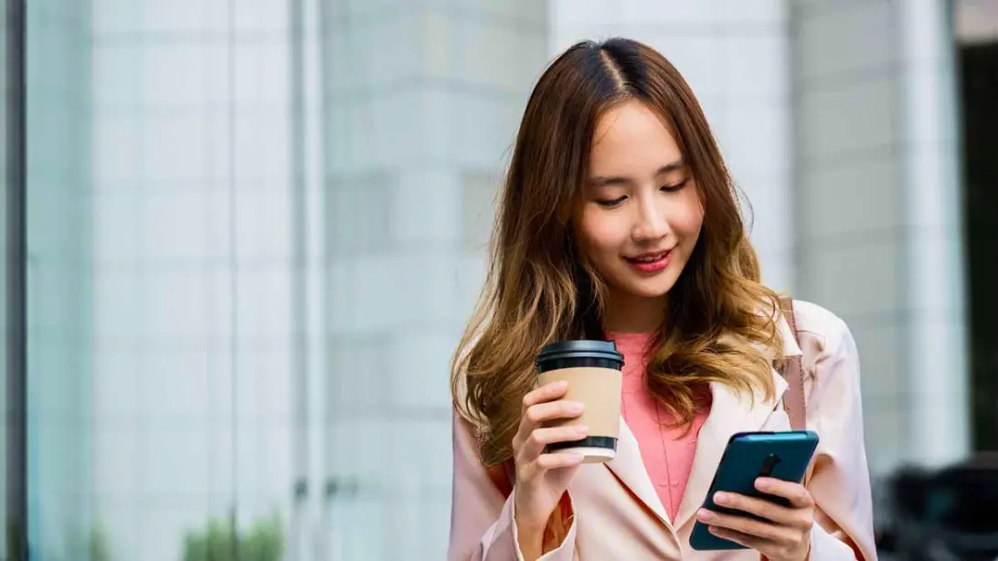 Person looking at an account alert on a phone