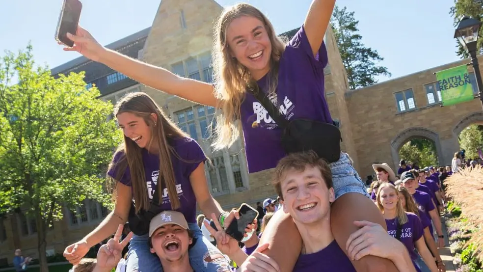 Group of students having fun on a college campus