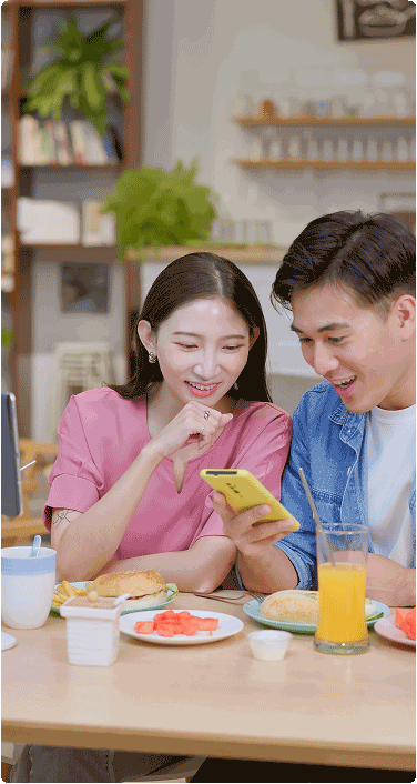 Couple checking their Bank Smartly Checking account.