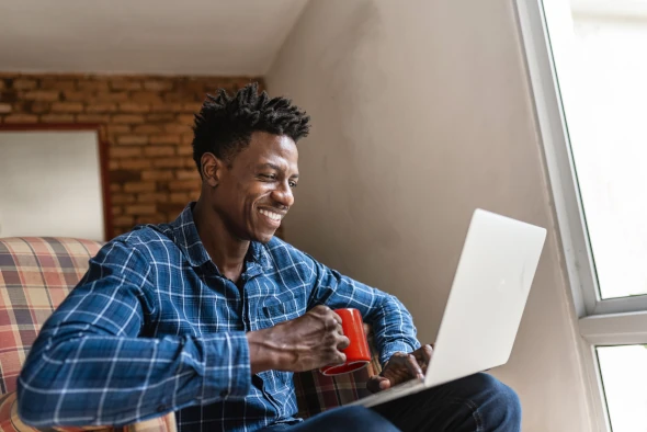 Man looking at laptop computer