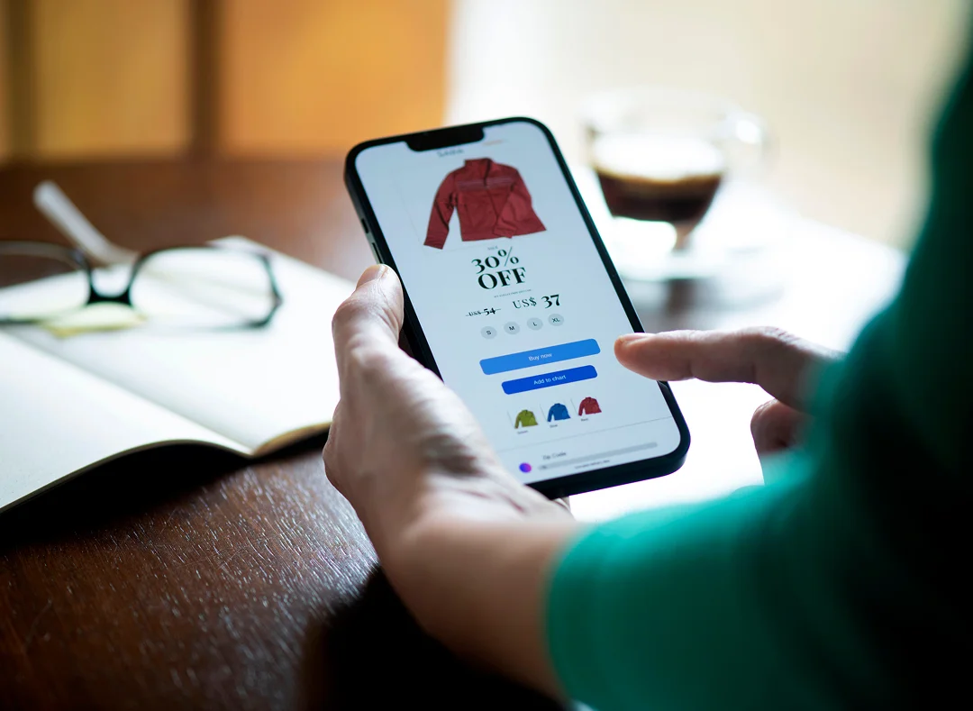 Person shopping online using a smartphone