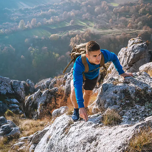 Man hiking up a mountain