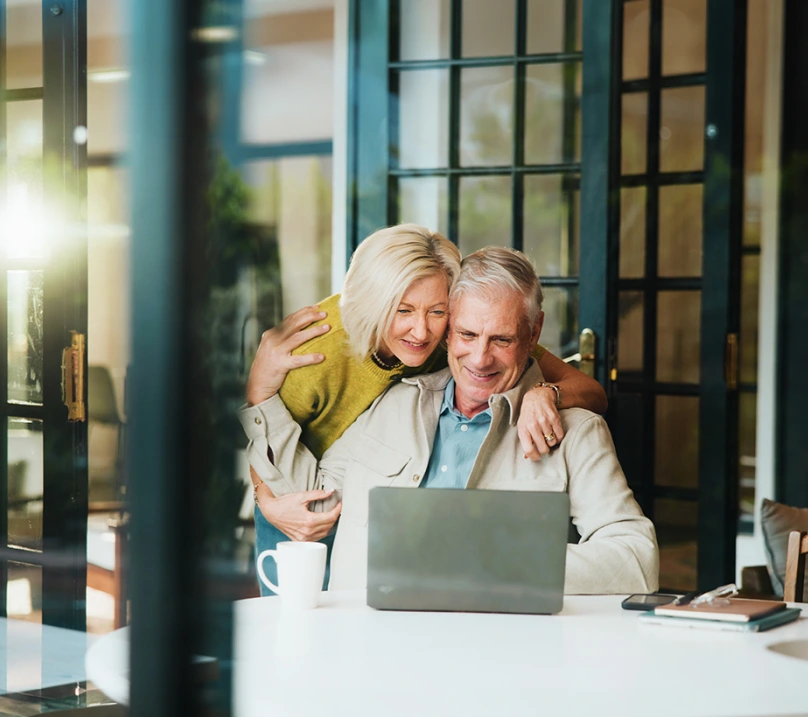 Image of a couple looking plan retirement fund