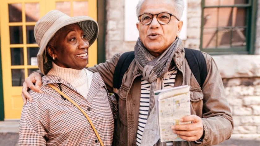 Older couple on vacation exploring the city