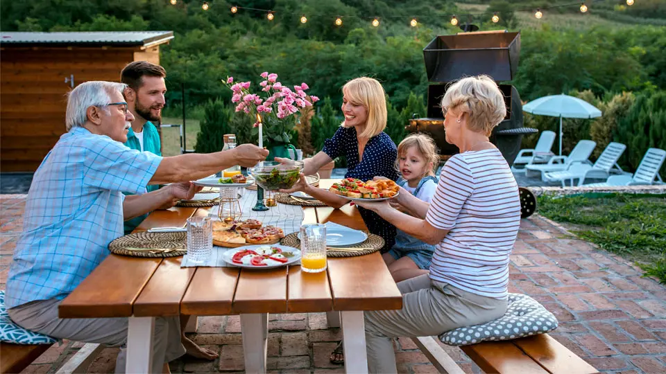 Family eating outside on a patio