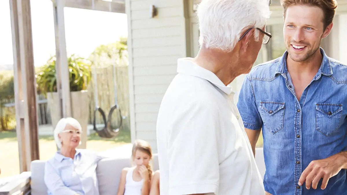 multigenerational family in backyard of their home