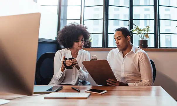 Business owners reviewing valuation