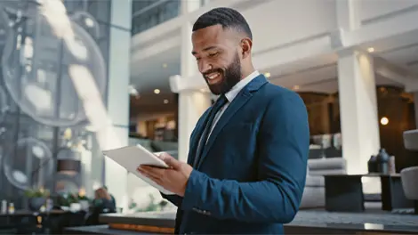 CEO using a tablet computer