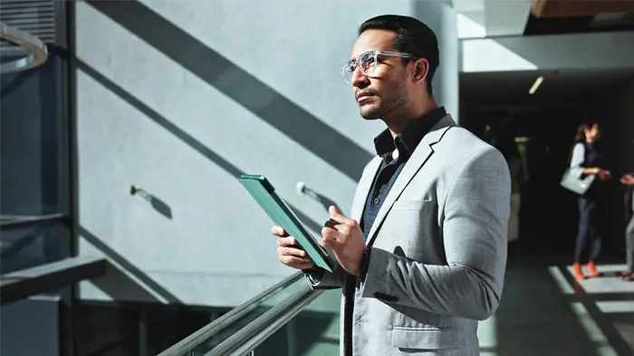 Business man holding a tablet