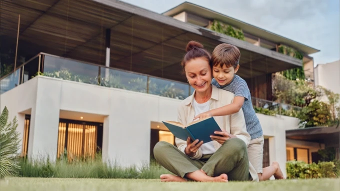 photo mother and son reading a book