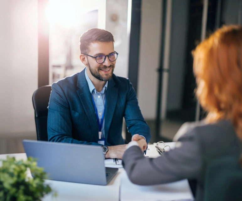 Customer meeting with a financial advisor at a desk