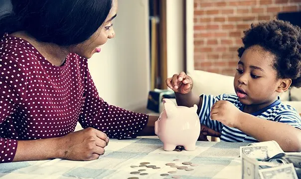 mother teaching child about money