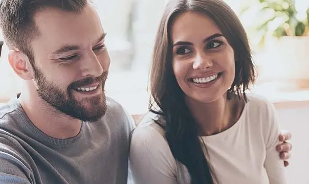 young couple smiling
