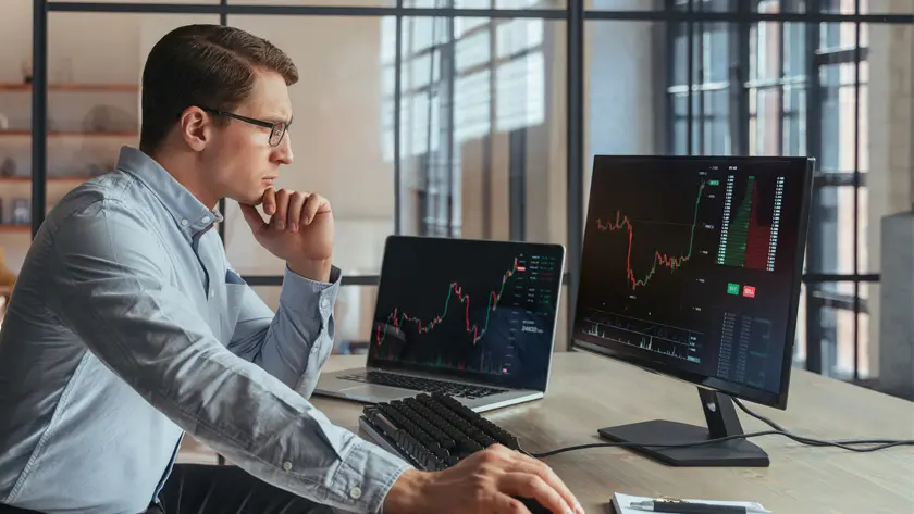 Man looking at market data